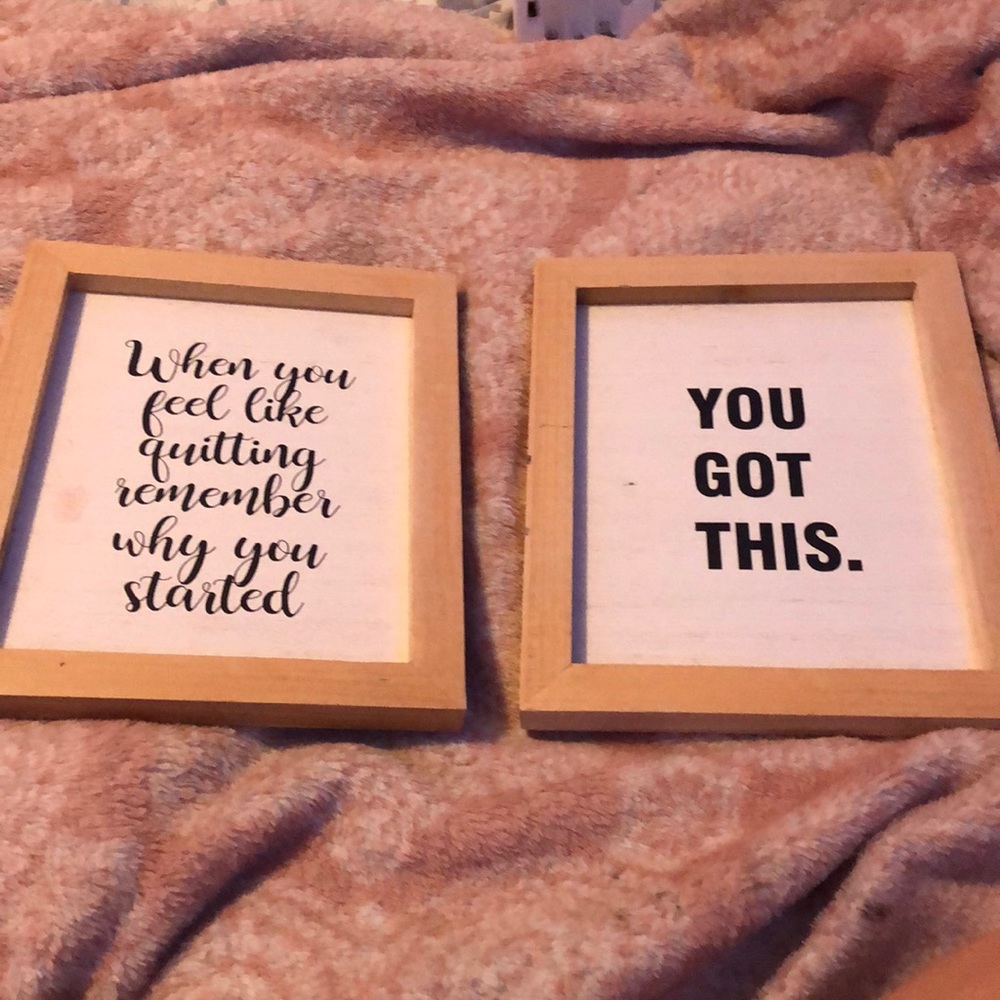 2 wooden framed signs